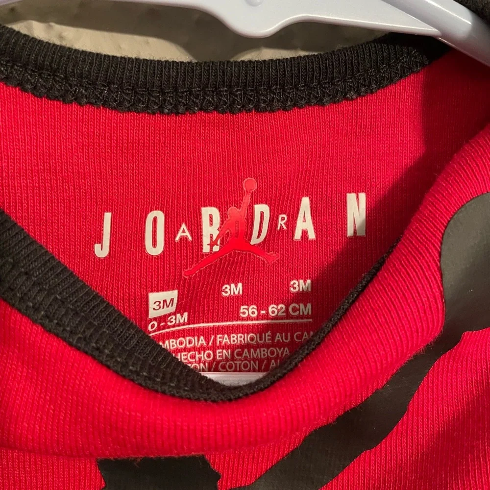 Baby Air Jordan Onesie size 3M.